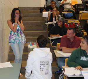 He popped the question in her Criminal Justice class. She said YES!, like a boss. Photo of courtesy of Dolage and Mikhael 