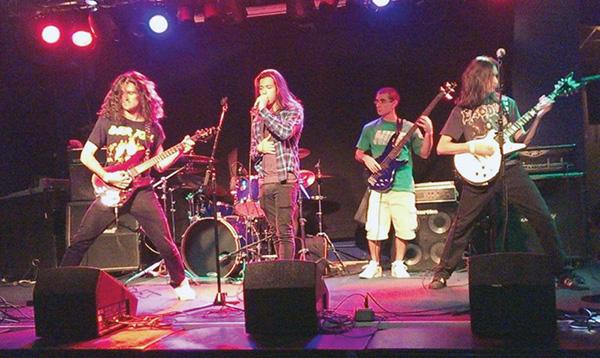Xenophile, performing live here, is currently writing their full-length, “Systematic Enslavement.”  (Photo courtesy of Ron Iglesias)