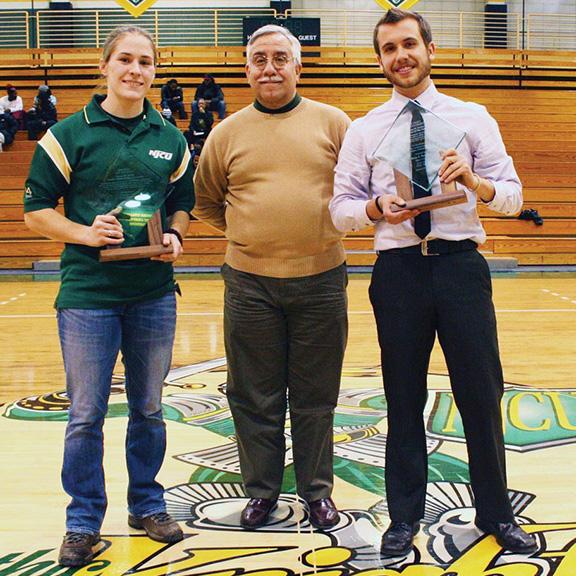Brittany Hoffman (left) and Brian Ferrante (right), pictured with faculty athletics representative Juan Arroyo, were honored with NJCU’s two major awards on January 22. Photo courtesy NJCU Athletics
