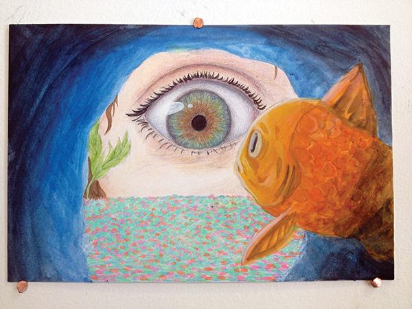 Fishbowl, painted by Steffany Ojeda, using gouache, Steffany captures a feeling of being cornered and scrutinized by being, referencing the “all seeing eye.” Photo by Sandy Asto