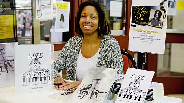 Self published author Jessica Baggett, media arts major of Jersey City, at her book signing at the NJCU bookstore. Photo by Dakota Santiago